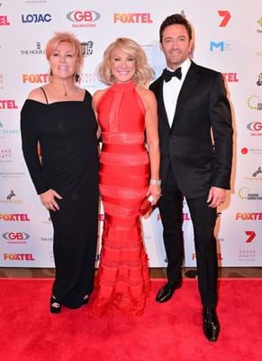 Deborra-lee Furness, Hugh Jackman and Kerri-Ann Kennerly on the Red Ball Melbourne red carpet.