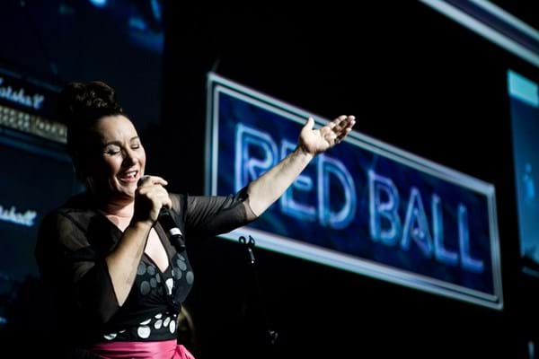 Grace Knight performs at Fight Cancer Foundation's Red Ball Melbourne in 2009.