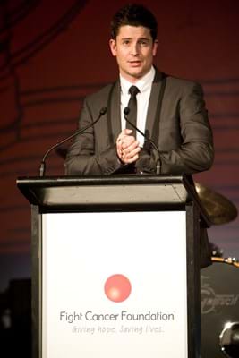 Paul O'Brien on stage at Fight Cancer Foundation's Red Ball Melbourne in 2010